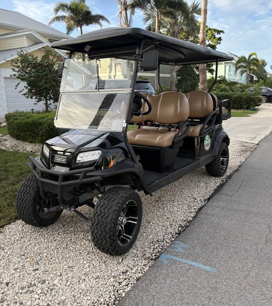 Golf cart parked on Anna Maria Island Golf cart parked on Anna Maria Island